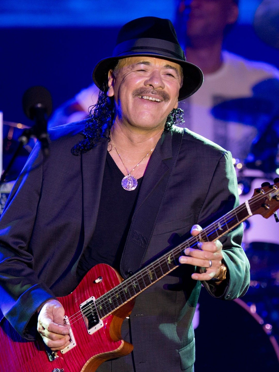 How tall is Carlos Santana?